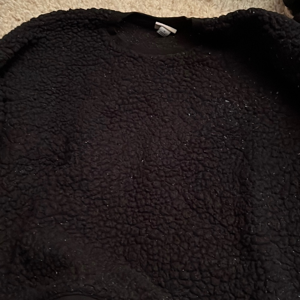A new day small black fuzzy sweater